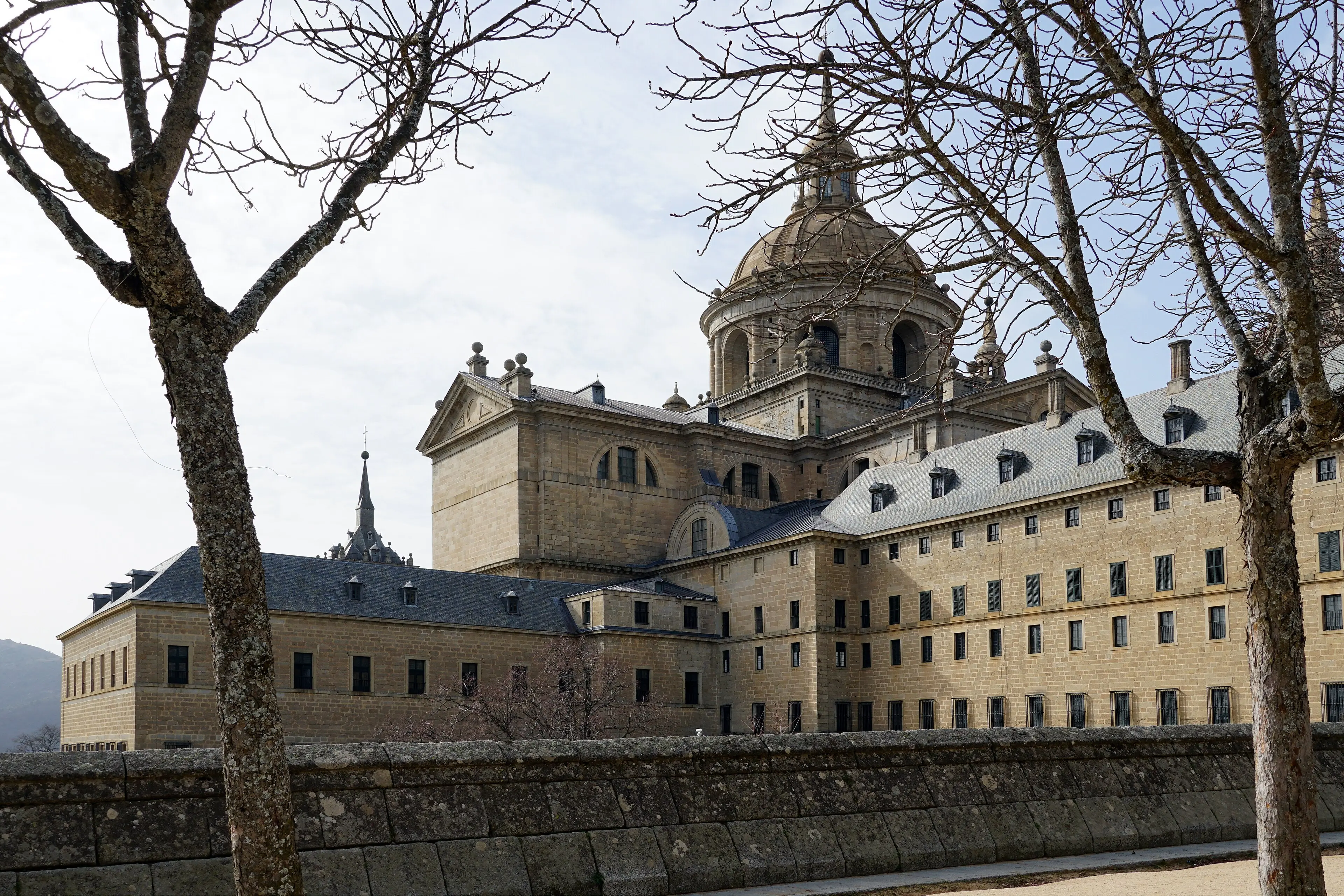 The Monastery of San Lorenzo de El Escorial seen from the north-east, with the sierra behind